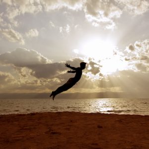 Defying Gravity - One-person-acrobatic-jumping-scene-symbolize-vitality,-aspiration,-success,-progress-000010811119_400px